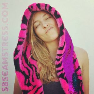 Megan Illgner models a pink flip sequin tiger hood